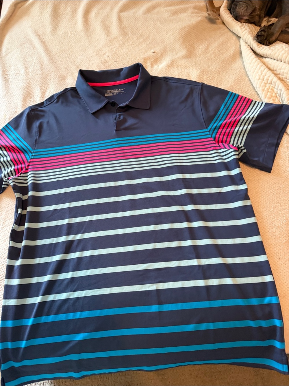 Nike Men's Navy Polo with Aqua and Pink Stripe Accents
